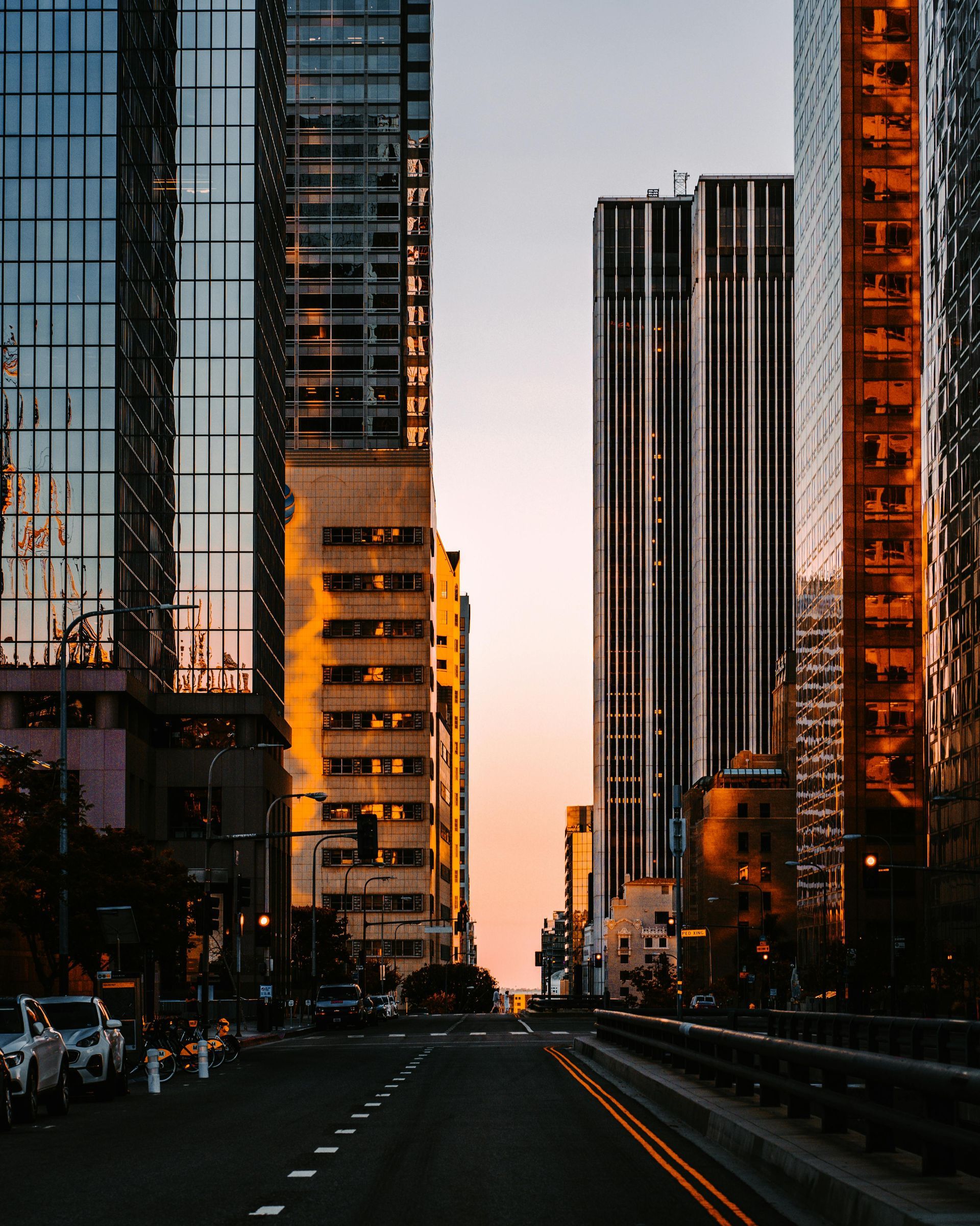 A city street with a lot of tall buildings