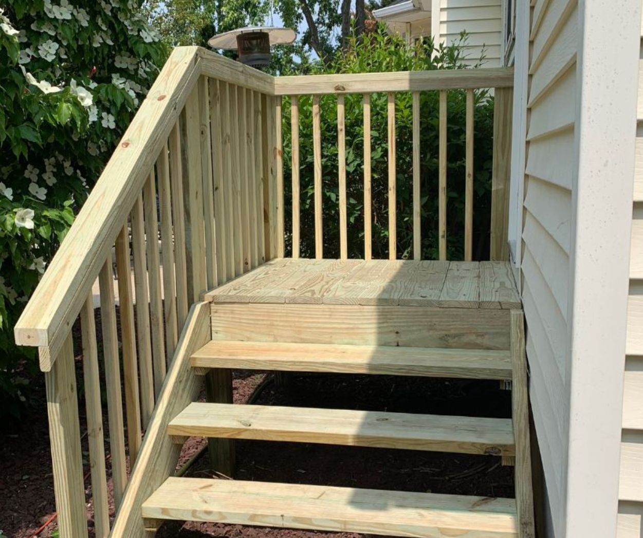 Freshly built wooden deck by Honey-Doo handyman in Sayreville NJ