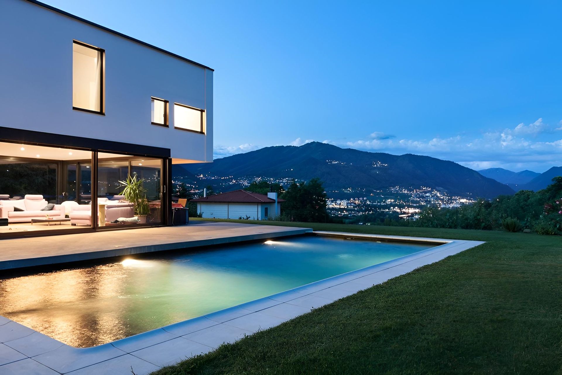 A House With A Large Swimming Pool In Front Of It — Ballina Pool Shop In Ballina, NSW