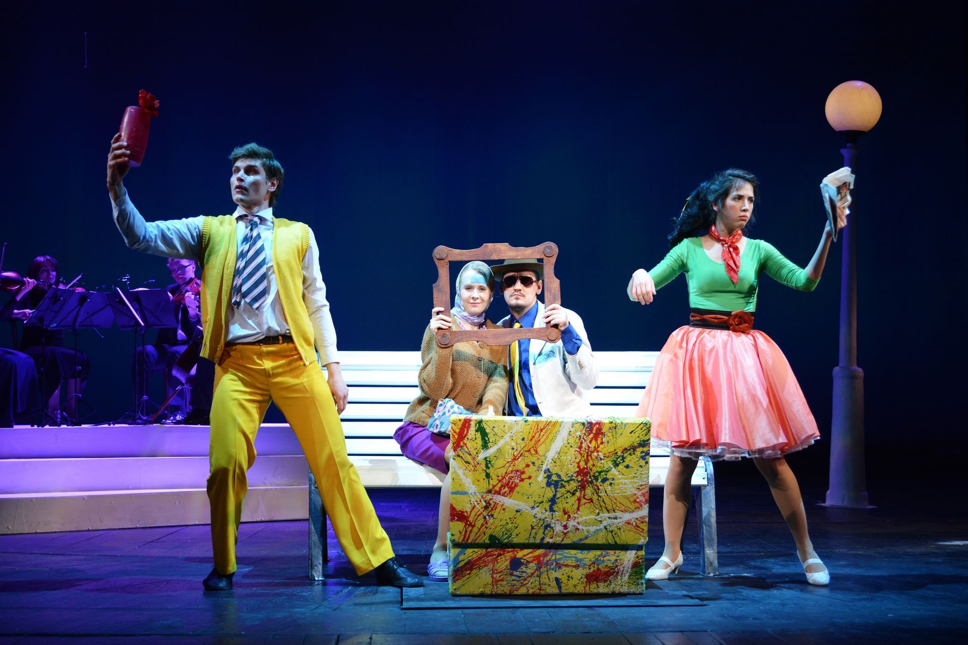 A group of people are standing on a stage in a play.