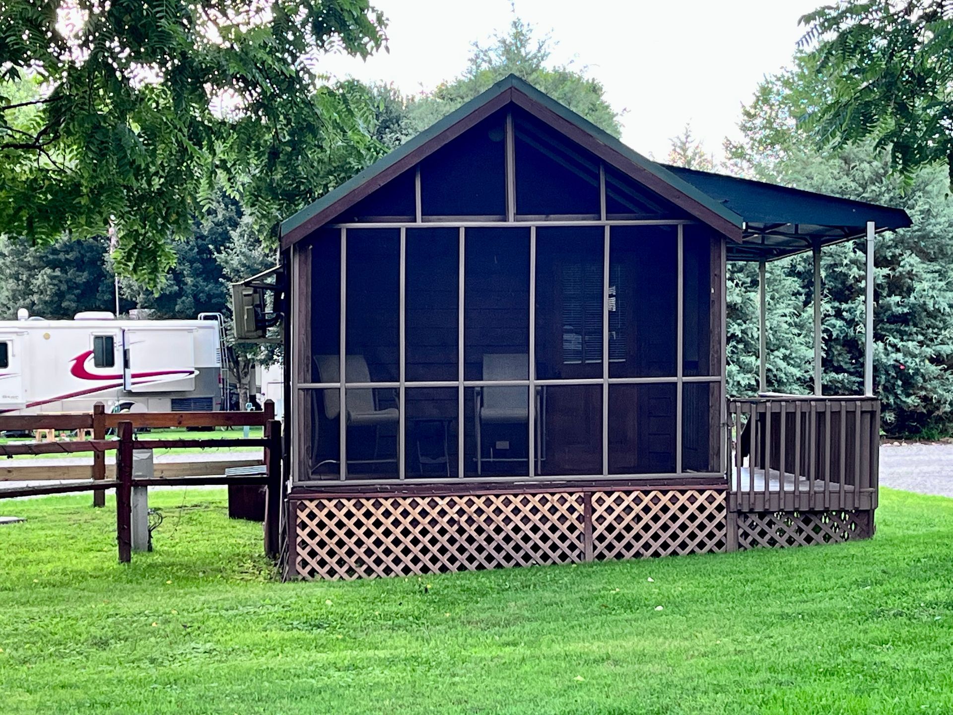 Cabin near Maggie Valley Nc at Creekwood Farm RV Park in a peaceful wooded setting.