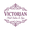 Victorian Nail Salon & Spa logo in mauve with ornate decorative flourishes