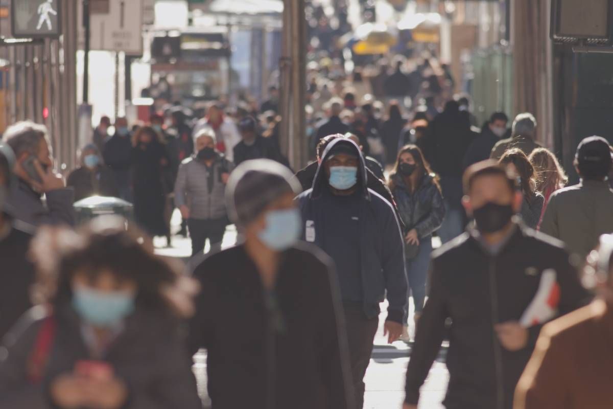 A crowd wearing masks as the cold weather sets in and brings illnesses at The Ready Care Clinic near Harrodsburg, Kentucky