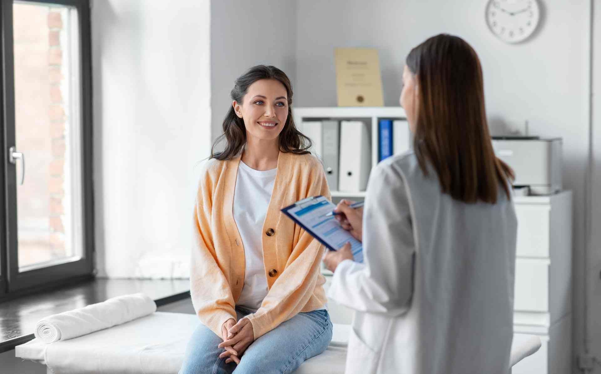 A woman in an examination room receiving healthcare services at The Ready Care Clinic near Harrodsbu