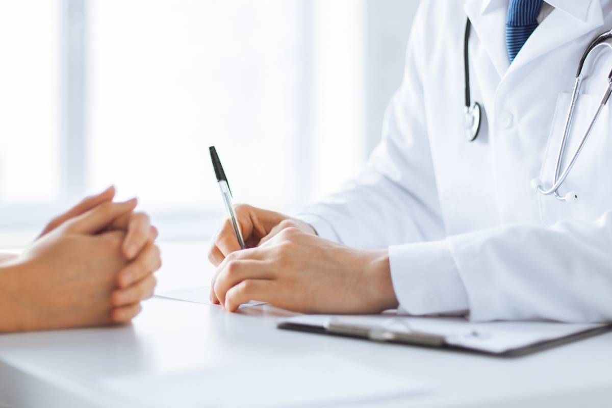 A doctor and a patient discussing medical information at The Ready Care Clinic near Harrodsburg, Kentucky