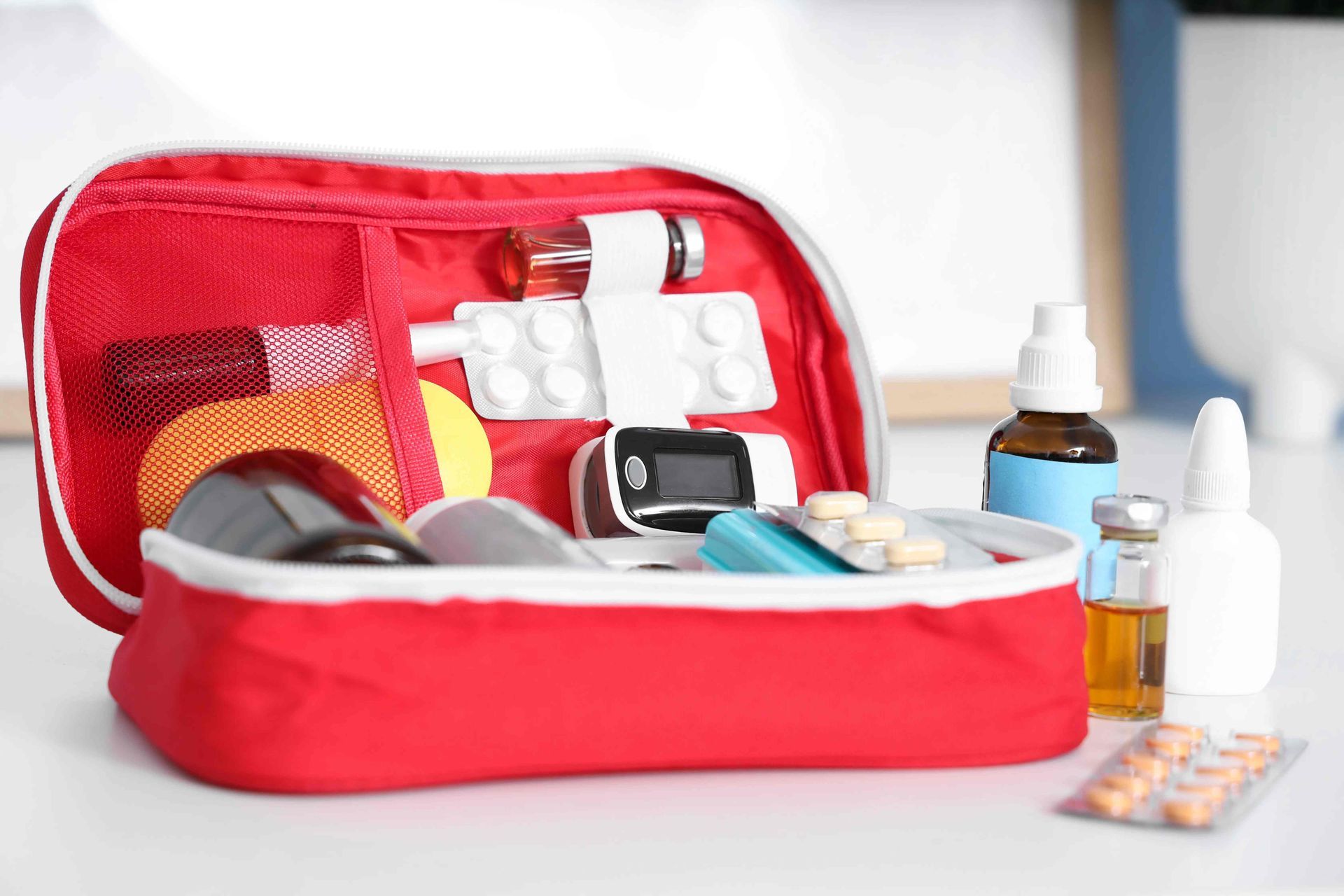 An open first-aid kit with a variety of necessary materials at The Ready Care Clinic near Harrodsburg, Kentucky (KY)