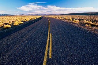 Road Passing Through a Landscape — Paving Services in Dallas, TX