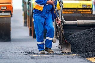 The Workers And Asphalt Machine — Paving Services in Dallas, TX The Workers And Asphalt Machine — Paving Services in Dallas, TX