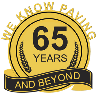 Gold seal celebrating 65 years of paving. Text: 