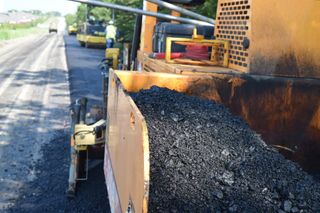 Road Passing Through a Landscape — Paving Services in Dallas, TX