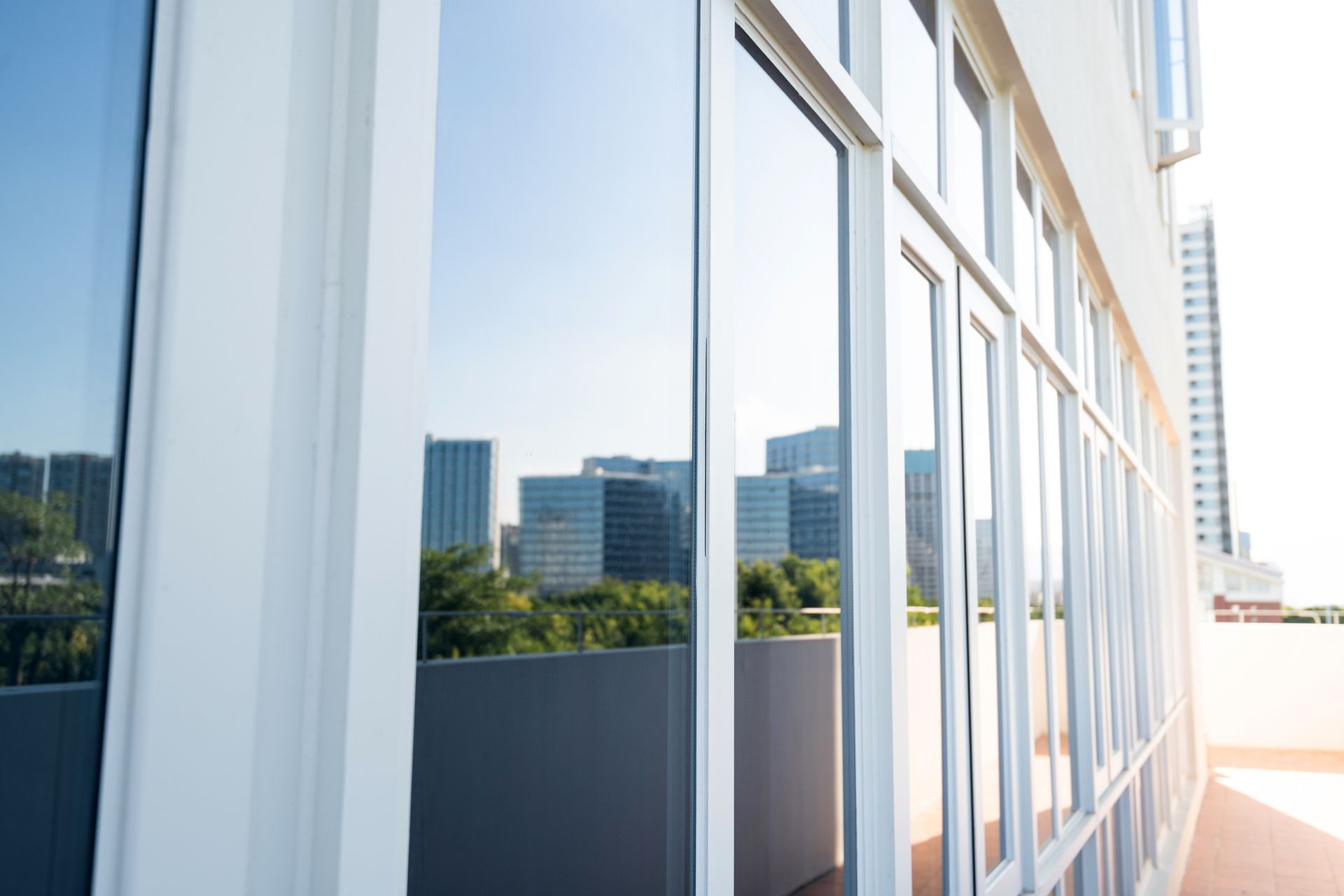 Tinted glass windows of a modern building.