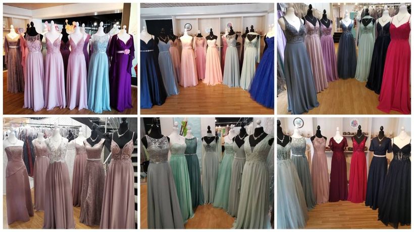 Ein Laden voller Kleider, die an den Ständern hängen.