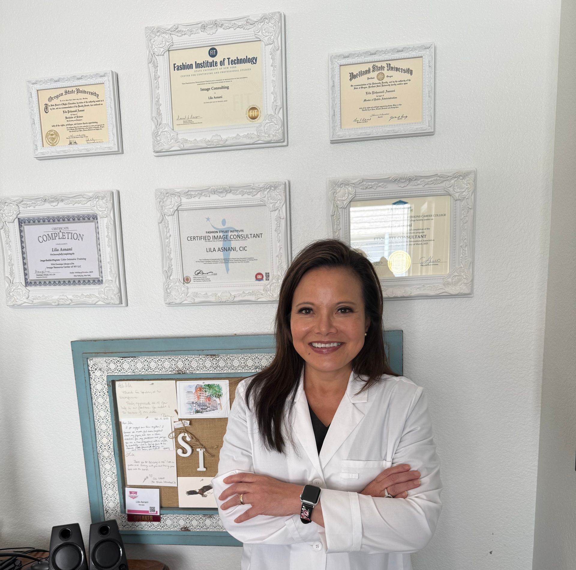 a well-dressed, professional woman smiling in a work environment