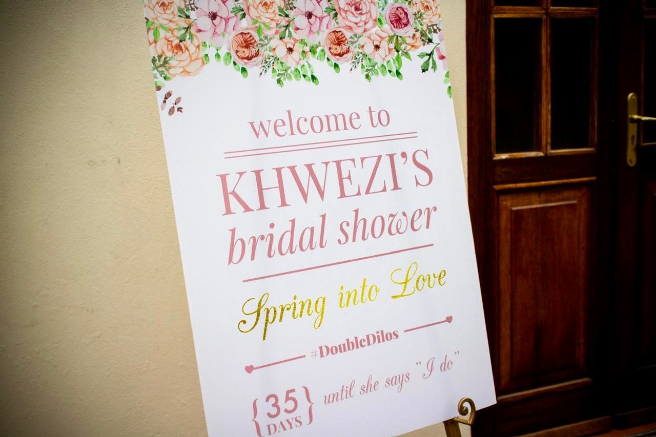 A sign that says welcome to khwezi 's bridal shower