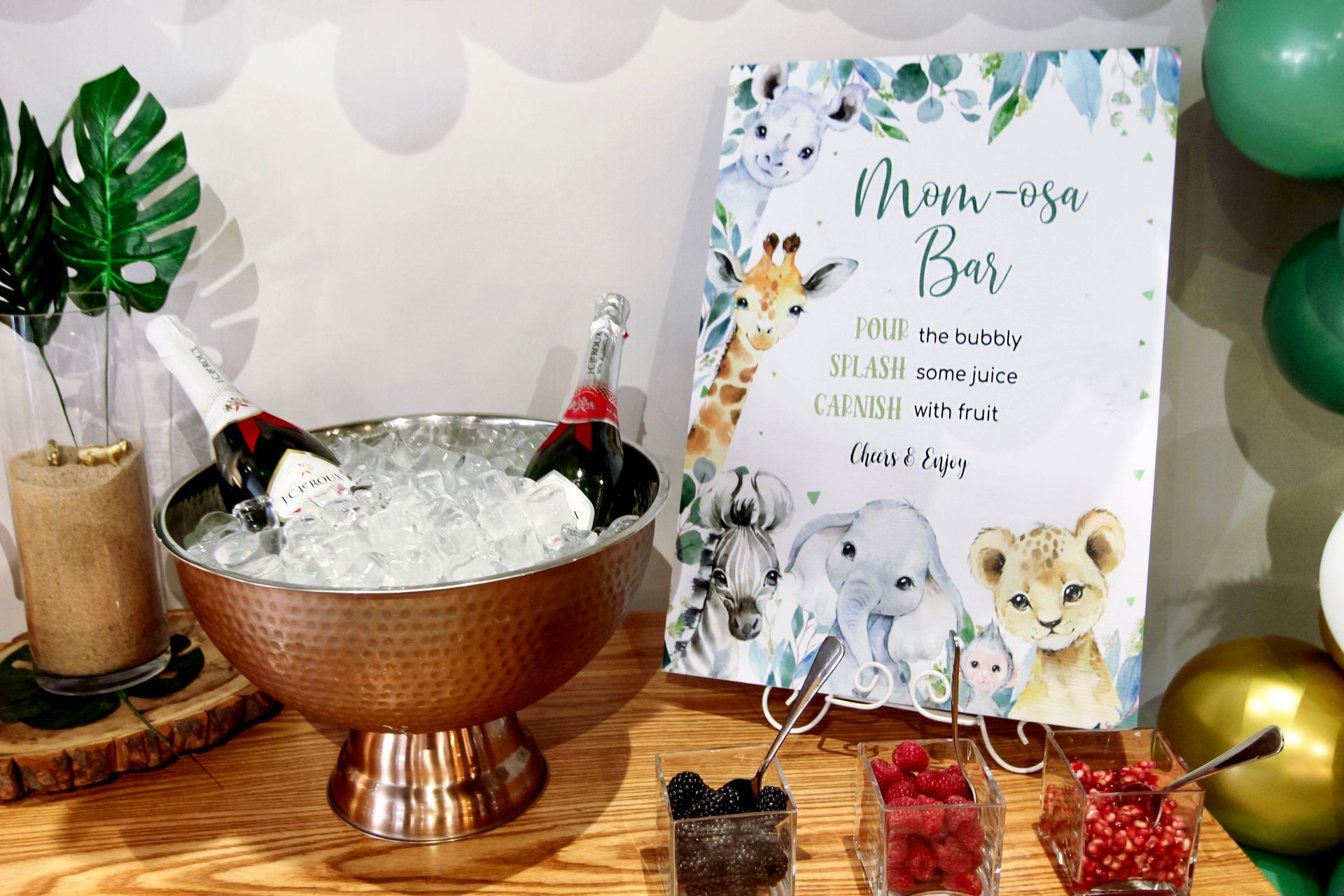 A table with a bowl of ice and a sign on it.