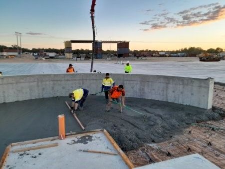 Workers pouring concrete | Bunbury, WA | Hutton Concrete