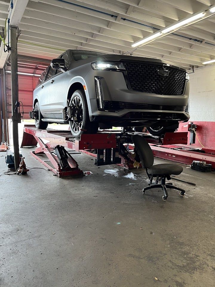 Silver Cadillac Escalade SUV | Chapmans Front End & Brakes