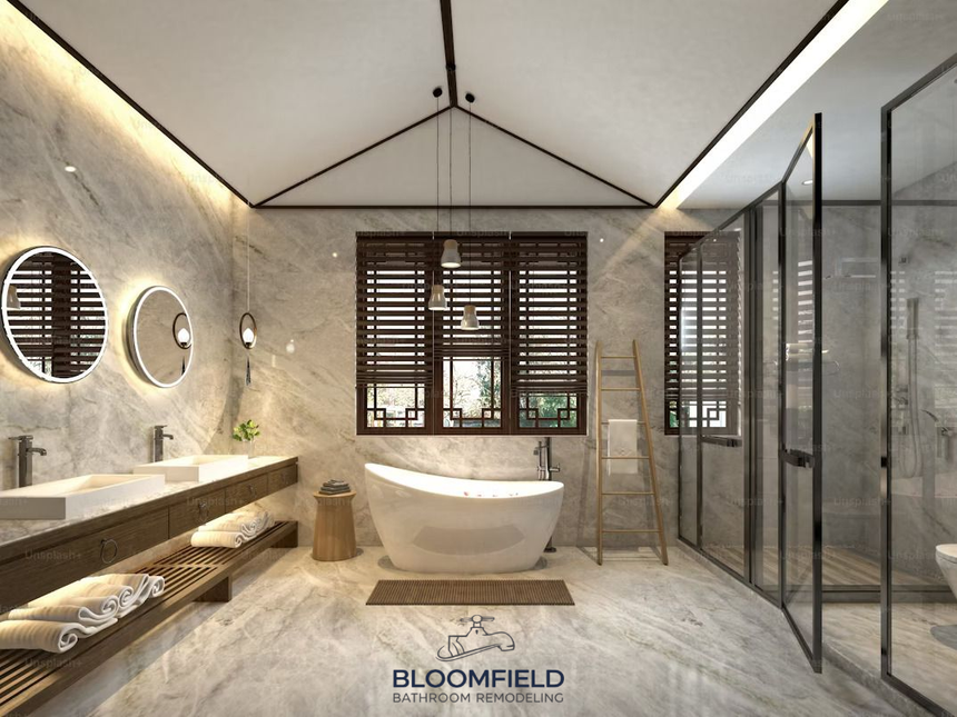 massive bathroom with single bath tub as center, with marble walls and floor