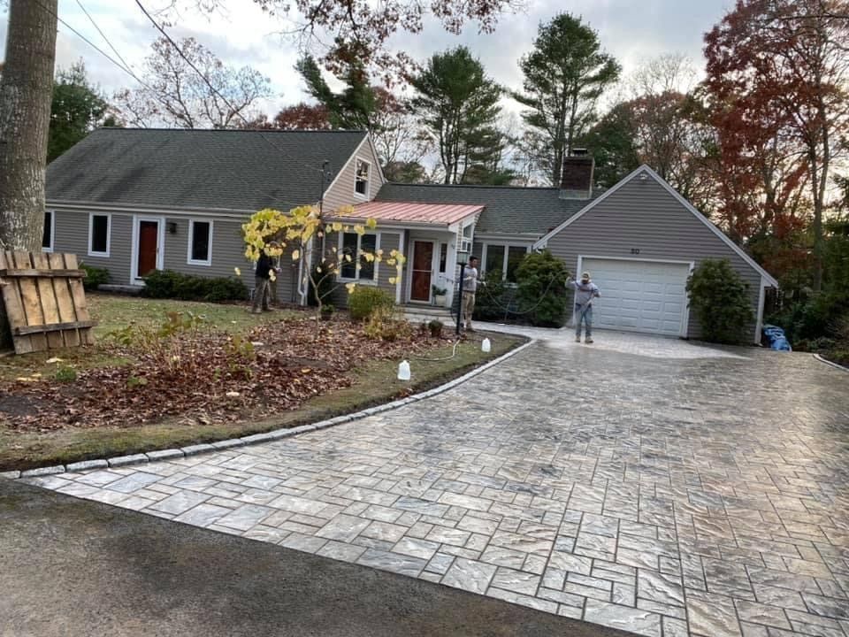 Cleaning Driveway — Hyannis, MA — Empire Masonry & Landscape Inc.