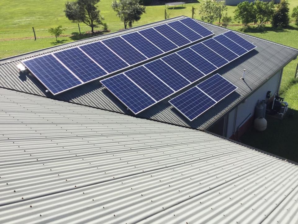 A Roof with A Lot of Solar Panels on It — Central Solar Services in Garbutt, QLD