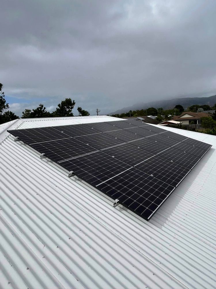 A Roof with A Lot of Solar Panels on It — Central Solar Services in Garbutt, QLD