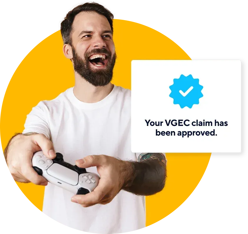 Gaming developer holding a controller looking happy