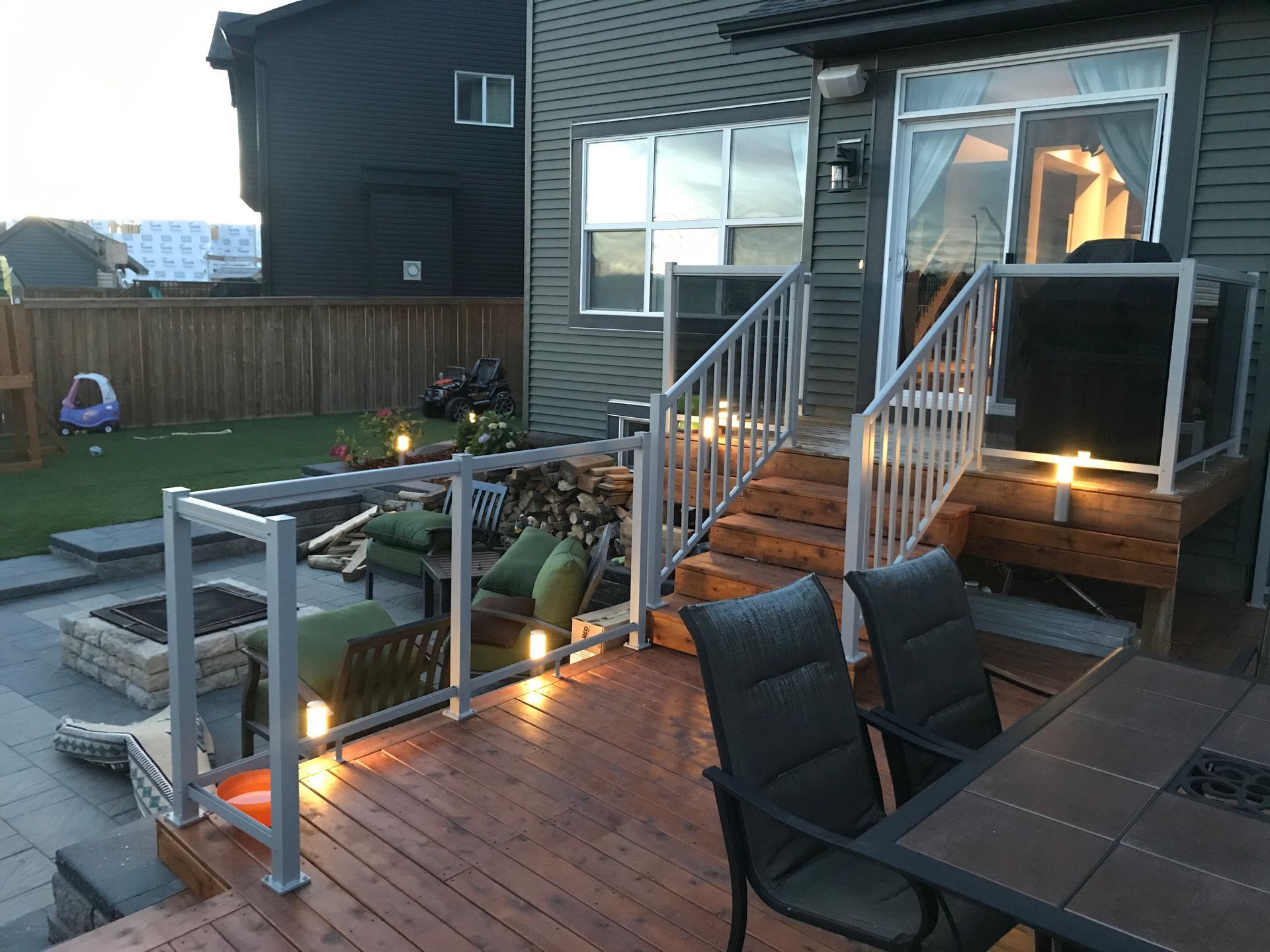 deck and patio design with railing