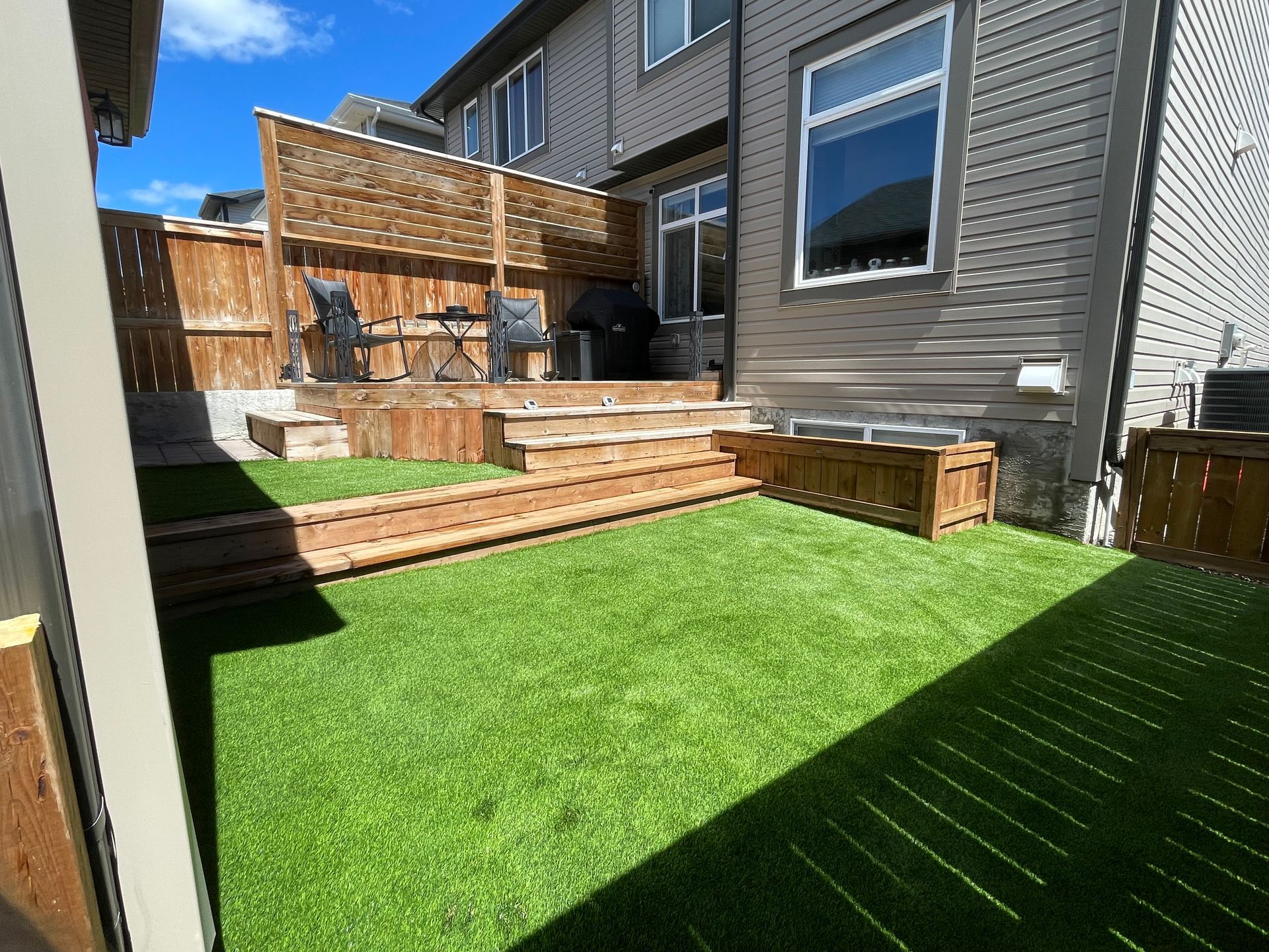 synthetic grass and raised deck 