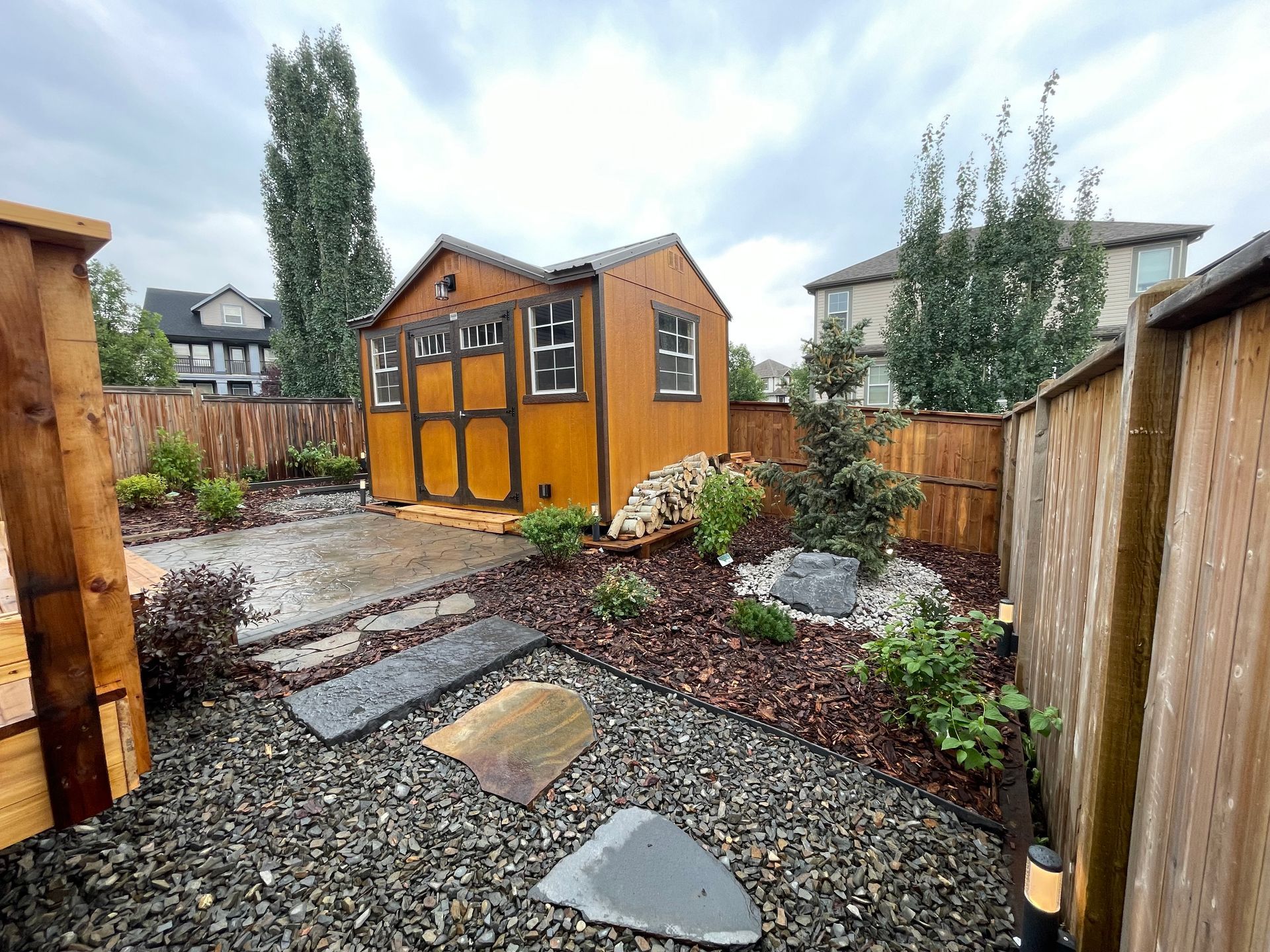 whole yard landscaping with shrubbery and mulch