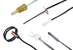 There are many different types of thermometers on a white surface.