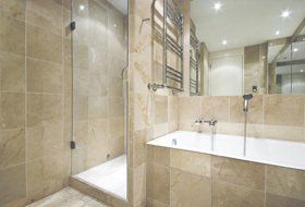 bathroom with glass fronted shower