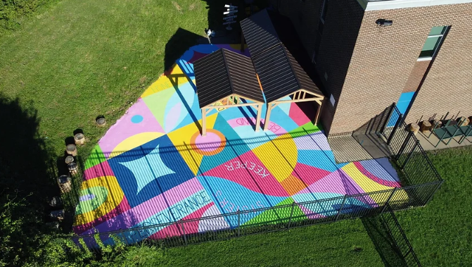 black girl joy mural Lillie may Carrol Jackson charter school