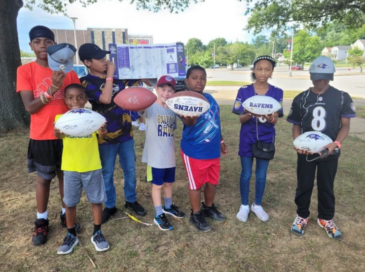 Ravens Training Camp - Kids with Footballs