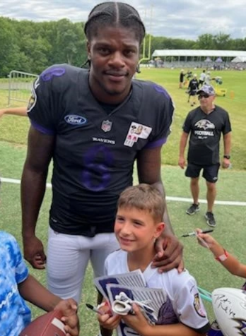 Ravens Training Camp - kids with lamar jackson