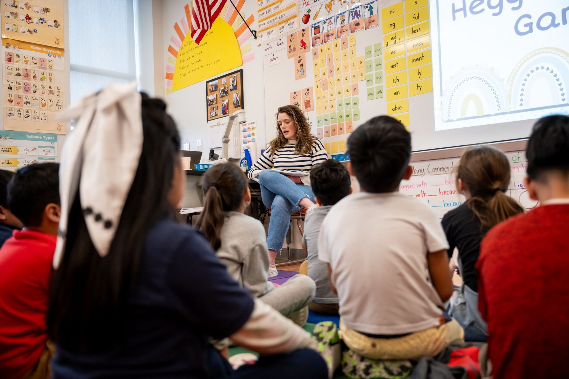 Female teacher talking to her classroom