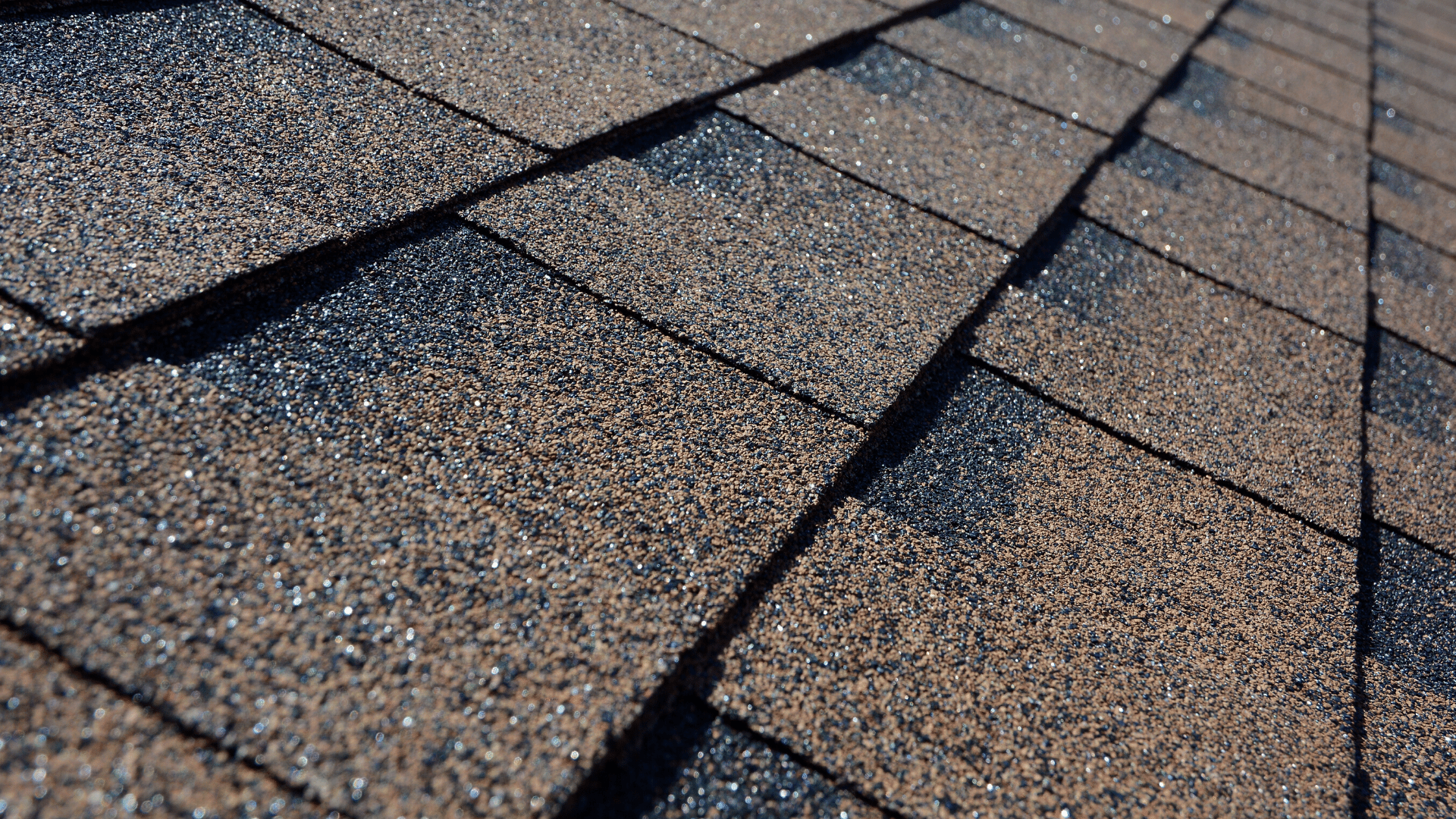 A close up of a roof with shingles on it.