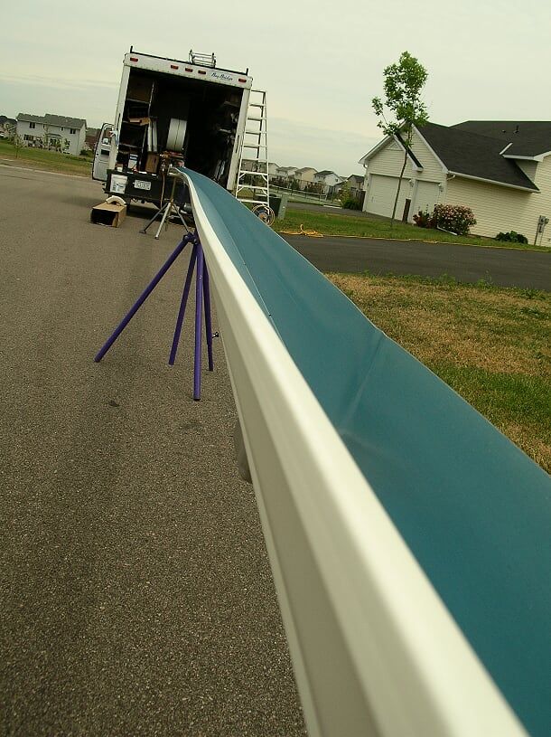 Downspouts — Gutter full of leaves in Savage, MN