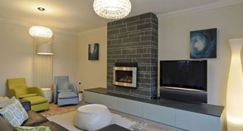 Polished slate feature fireplace