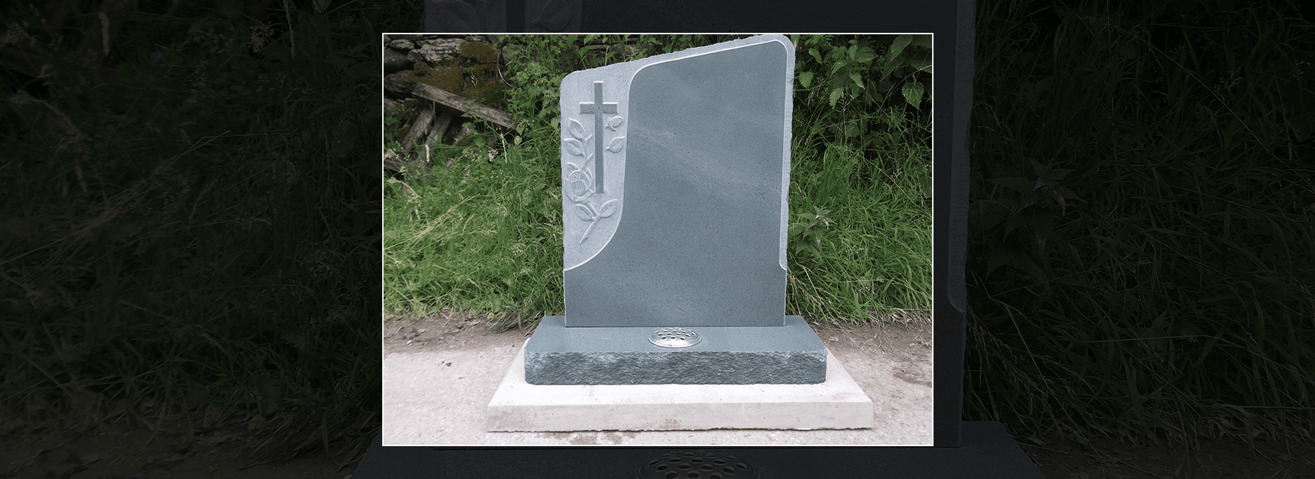 Lakeland green headstone with embossed cross and roses
