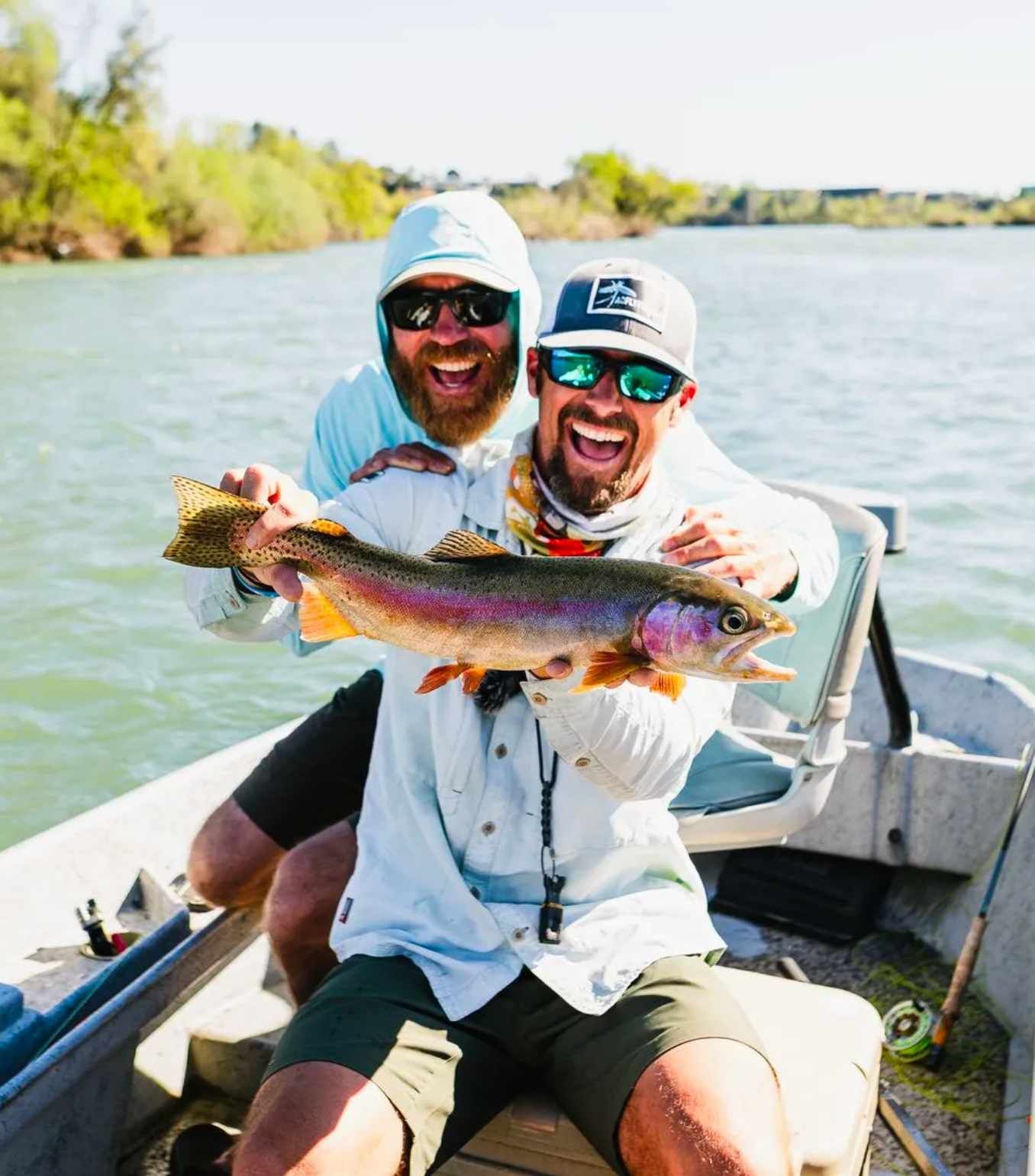 northern-california-fly-fishing-guides Guide and angler fly fishing on a Northern California river at sunrise