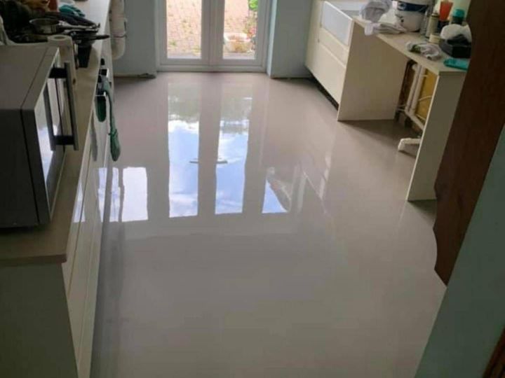 Derbyshire Flooring Specialists scrreding a floor as part of preparing a floor for laminate planks