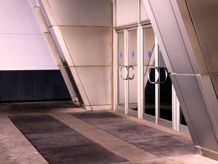 Derbyshire Flooring Specialists fitted door mats inside the entrance of a Derbyshire business