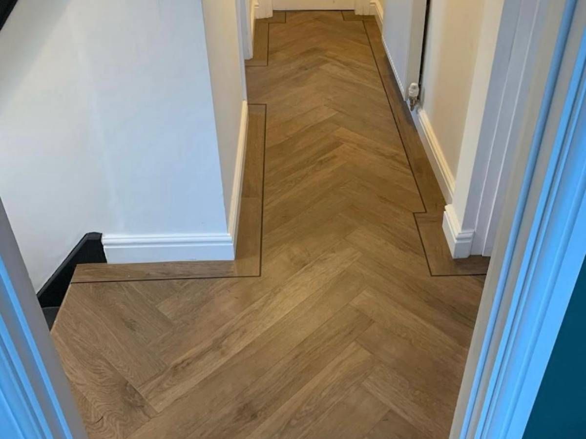 Derbyshire Flooring Specialists herringbone flooring for a landing in Derby