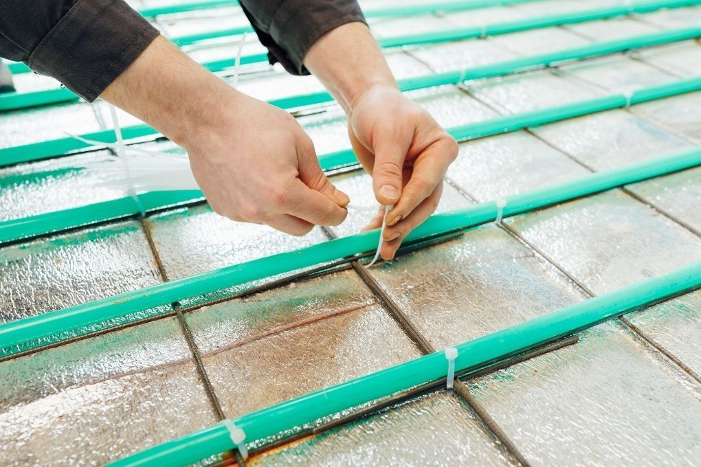 Derbyshire Flooring Specialists installing wet underfloor heating pipes