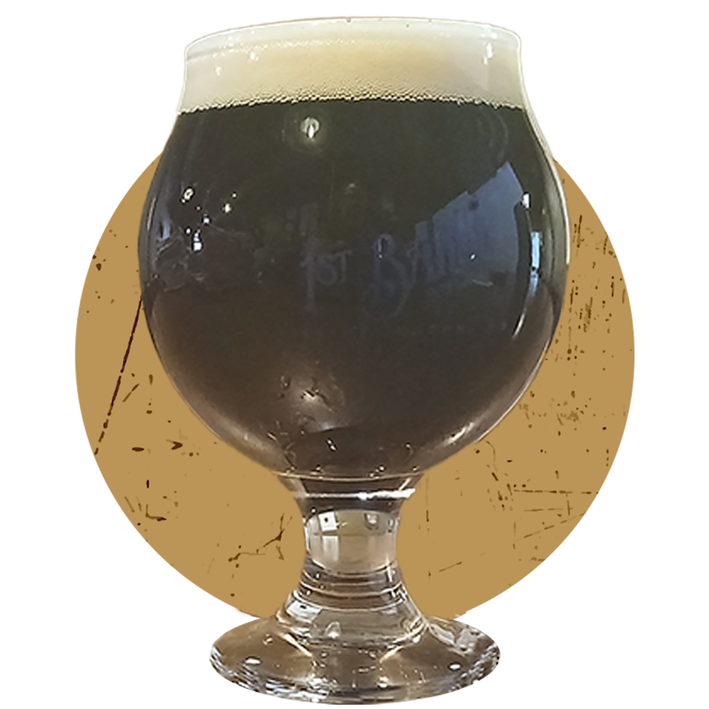 A glass of beer with the word barret on it