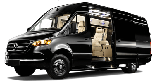 Black Mercedes-Benz Sprinter van with open side door, tan interior, parked outdoors.