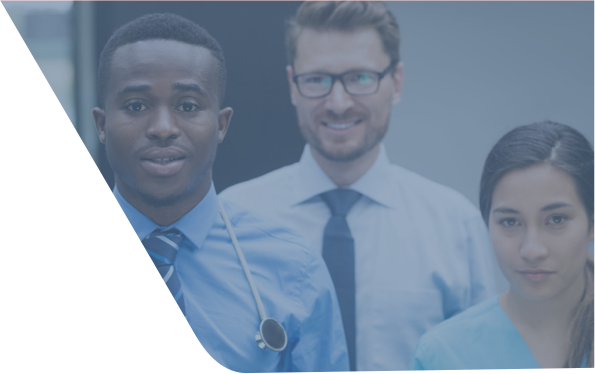 Group of diverse healthcare professionals smiling, indoors.
