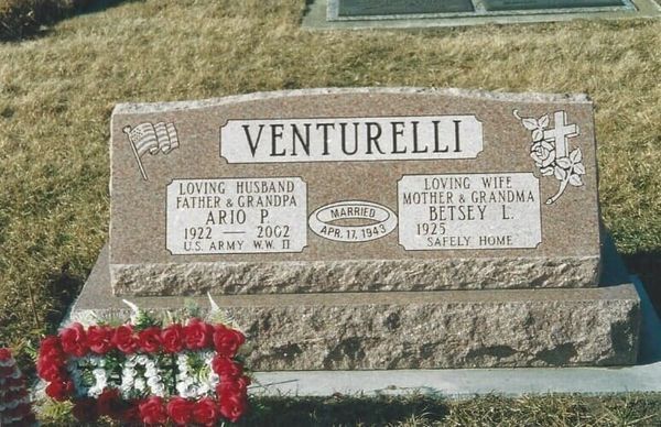 Headstone for the Venturelli family: Ario P. (1922-2002) and Betsey L. (1925), with details and a floral display.