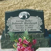 Tombstone of Deborah Murdaugh, with a photo, dates 1953-2002, 