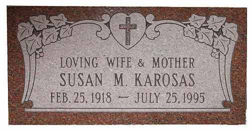 Headstone of Susan M. Karosas, with dates Feb. 25, 1918 - July 25, 1995. Includes a heart and cross design.
